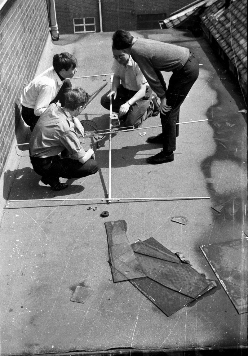 Assembling an antenna on the roof of Roxeth School