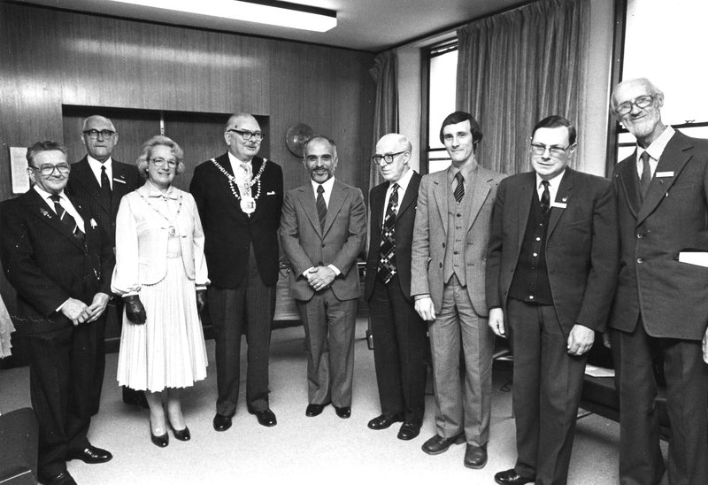 The photo shows King Hussein with some of the Club members and the Mayor and Mayoress of Harrow . From left to right: Bill Corsham G2UV; Norman Joly G3FNJ; Mayoress of Harrow; Mayor of Harrow; King Hussein JY1; Geoff Hodges G3KRT; Chris Friel G4AUF; Don Nappin G3MLS; Maynard DeBorde G4LKO