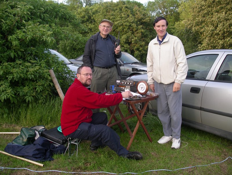 Open air operation showing David G0CAG, Jim M0YGW, and Chris G4AUF